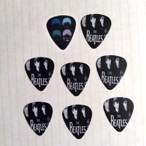 Beatles guitar picks (8)